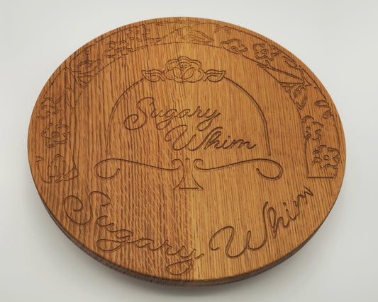 Wooden coaster with engraved text and design on a white background