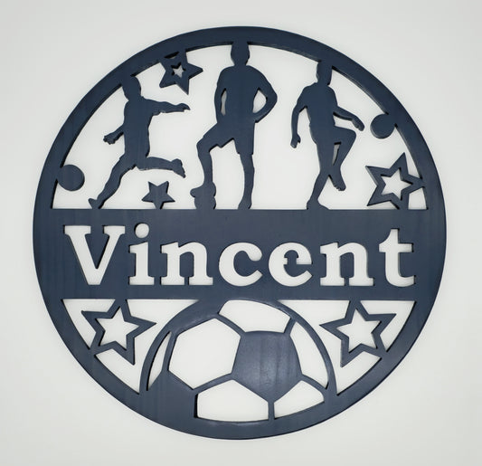 Decorative wall art with soccer-themed design and 'Vincent' text on a white background